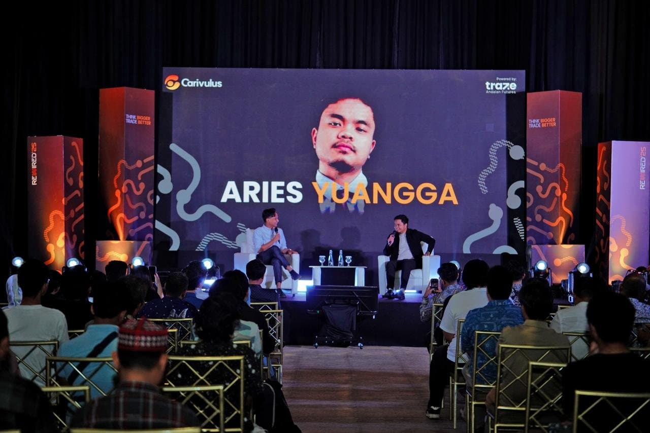 Aries Yuangga speaking at a public trading event